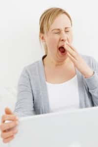 Yawning woman - could do with a few good sleep tips