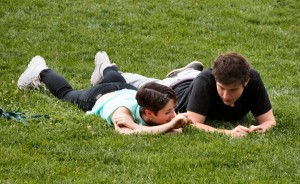 Couple practicing relationship communication in the grass